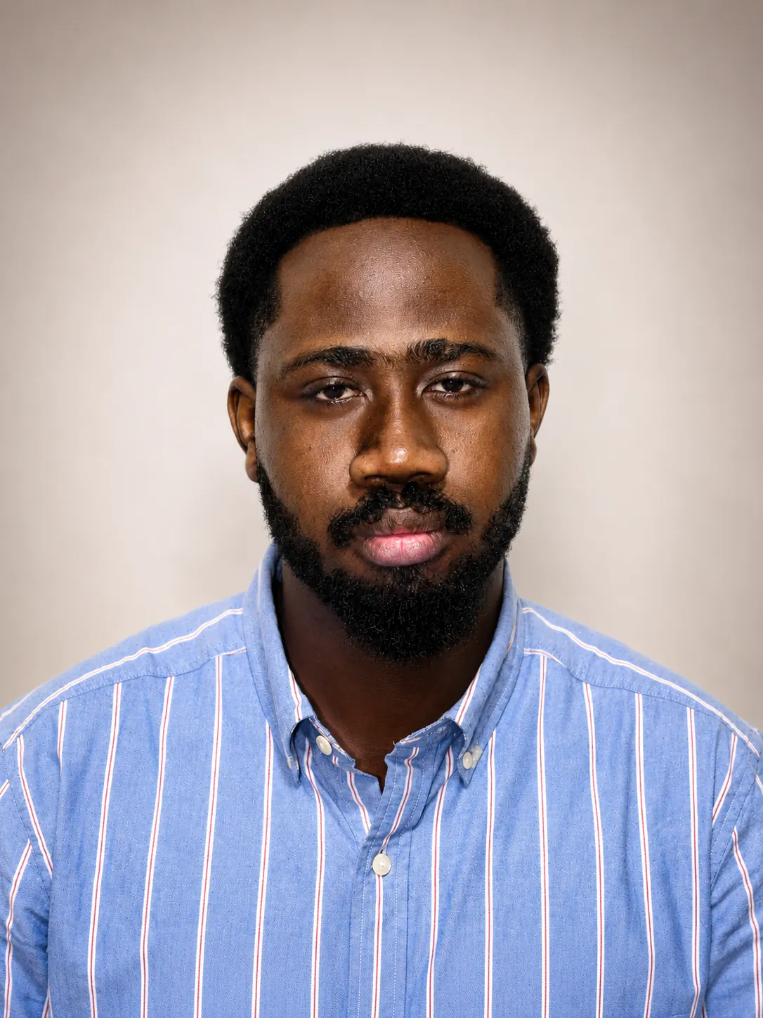 Portrait of Oluwagbemiga Emmanuel Aina, Junior Surveyor